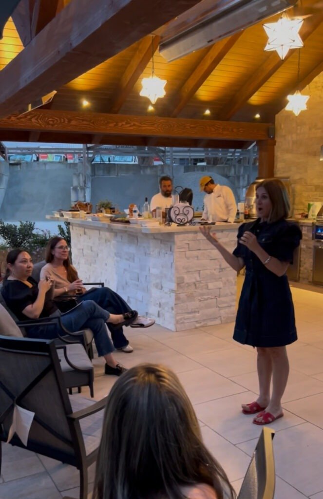 Parents gather for a community event sharing concerns and connecting to feel less alone.